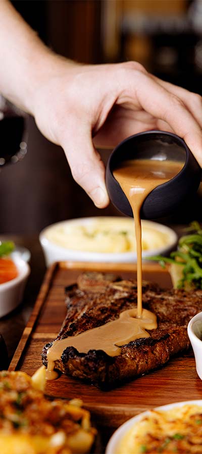 Peppercorn sauce and Steak