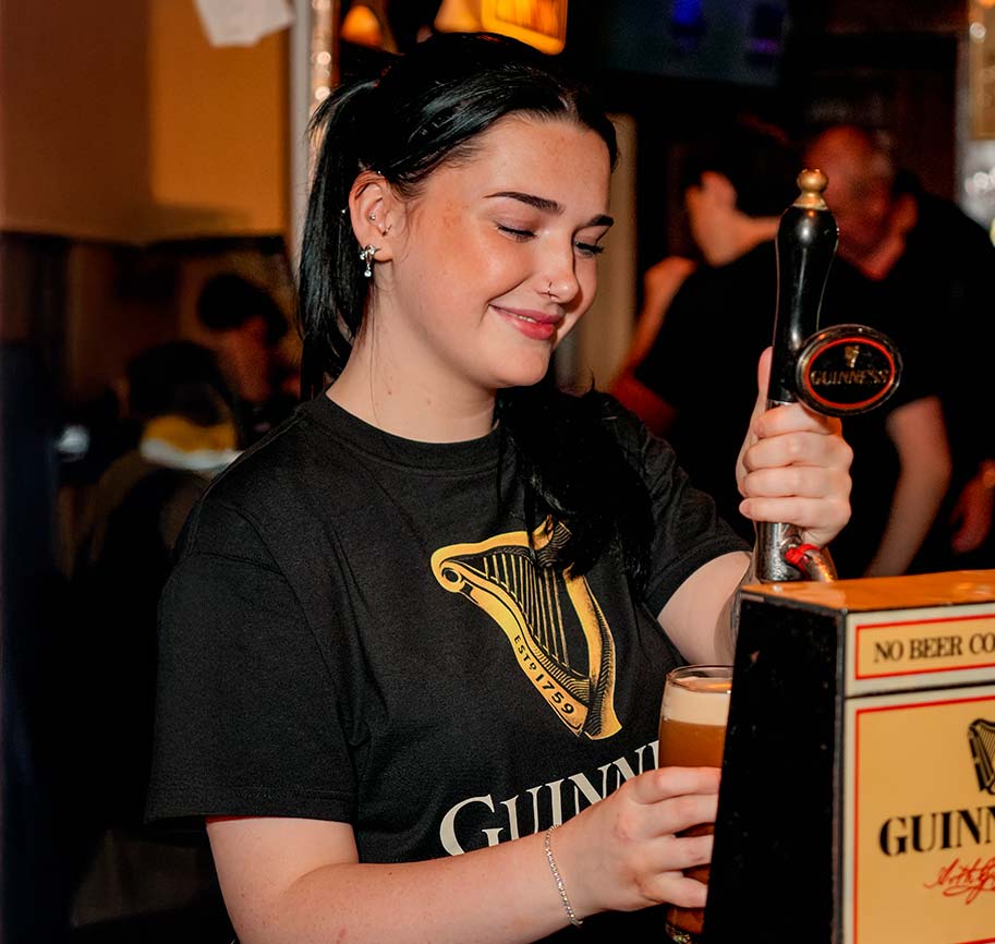 Pouring a pint of Guinness